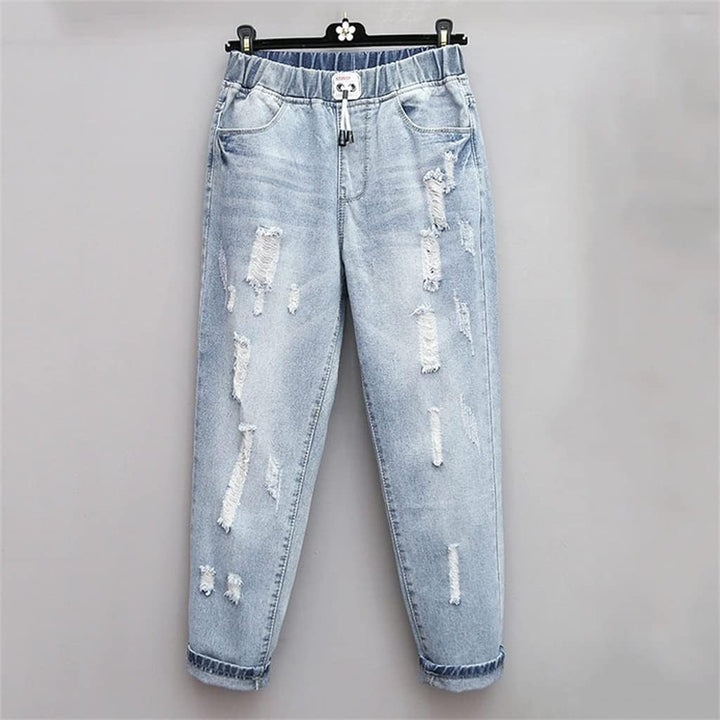 Damen High-Waist Jeans Übergröße, zerrissen, ideal für Herbst-Streetwear. Komfortable Plus-Size Curvy Mode.