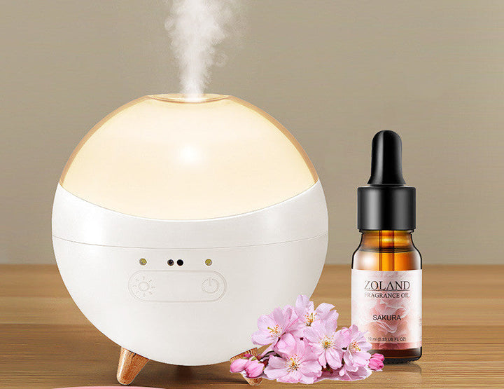 Edler Aroma Diffuser für angenehmen Raumduft und entspannendes Stimmungslicht, bedienbar via Gestensteuerung.