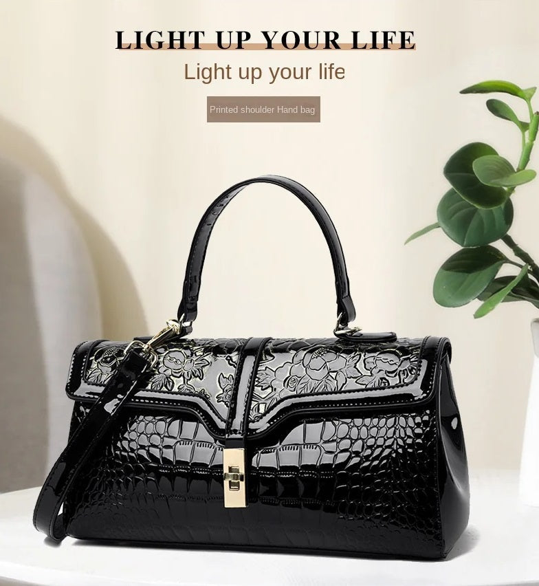 Exquisite Damen Handtasche, ein Mode Accessoire mit Blumenmuster für jede Gelegenheit.