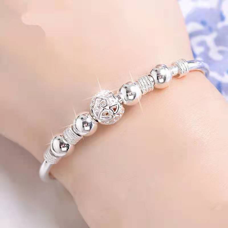 Elegantes Damen Perlenarmband aus 925er Silber mit runden Glücksperlen, ein stilvolles Schmuckstück.