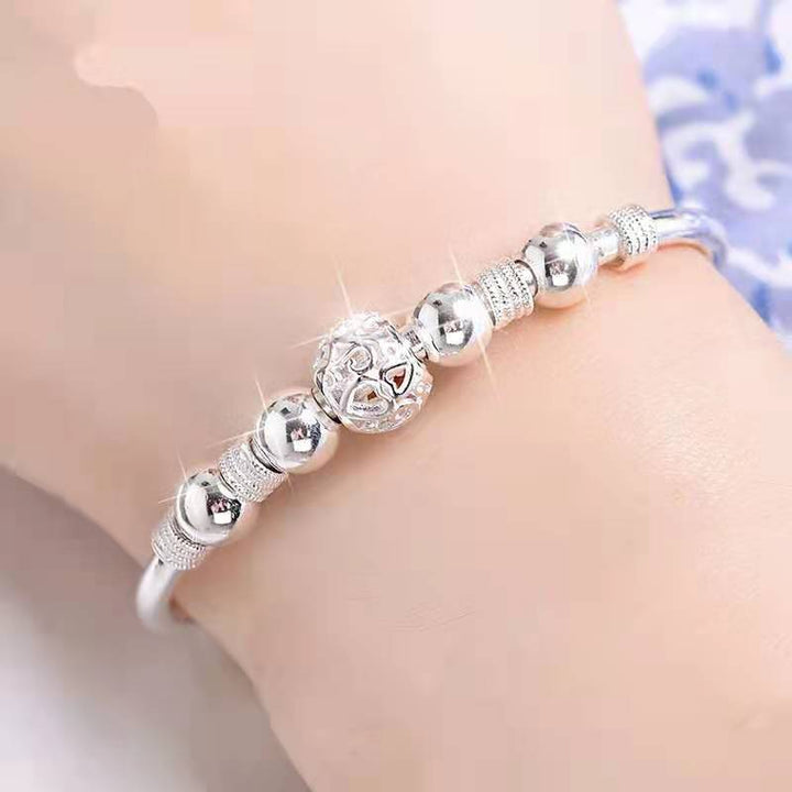 Elegantes Damen Perlenarmband aus 925er Silber mit runden Glücksperlen, ein stilvolles Schmuckstück.