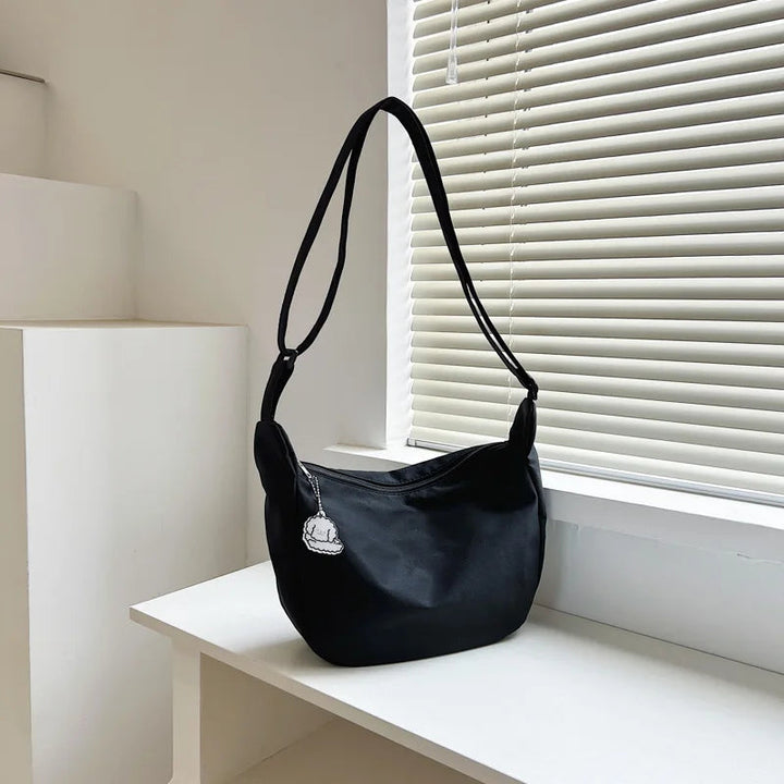 Funktionale Damentasche: Modische Crossbody-Umhängetasche, elegant & praktisch für stilbewusste Frauen.