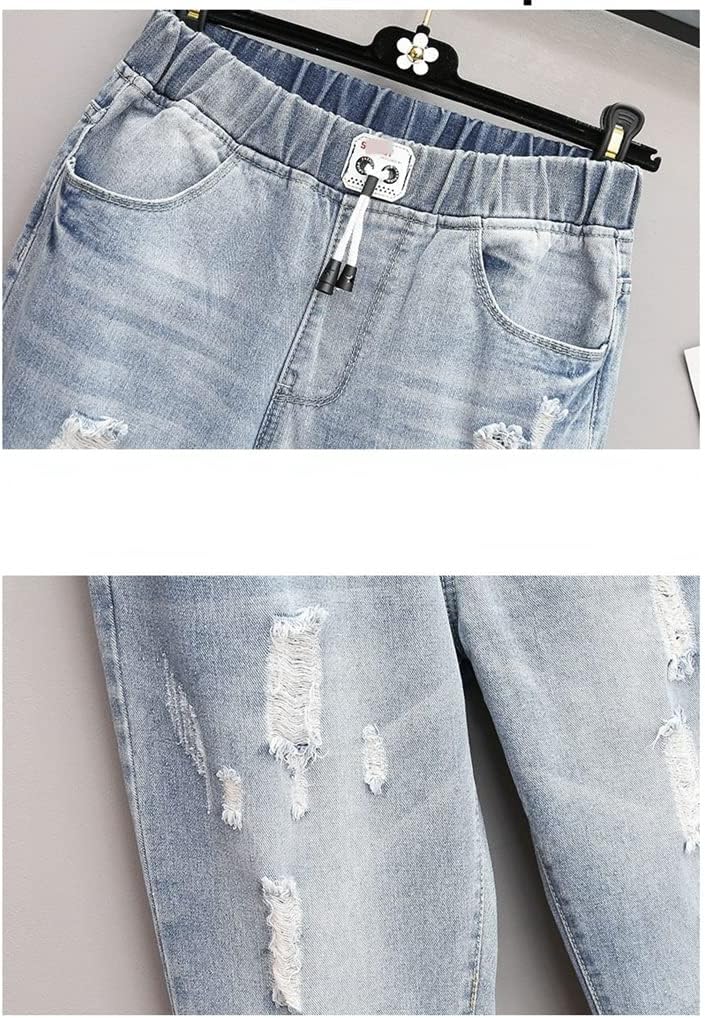 Stylische zerrissene High-Waist Jeans in Übergröße für Damen. Trendige Plus-Size Herbst-Mode für Curvy Fashionistas.