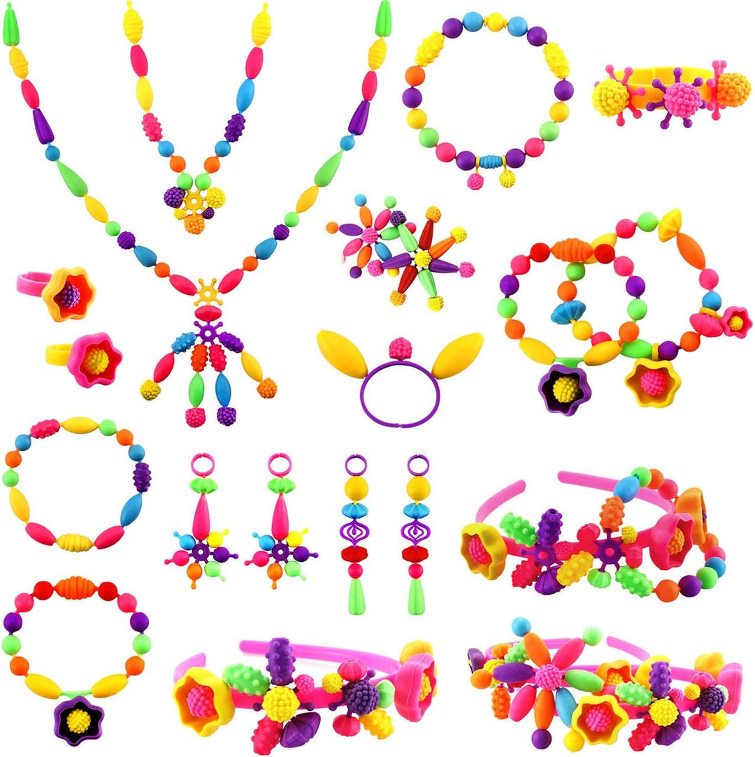 Kreatives Geschenk für Kinder: Bunte Schmuck-Stecksteine zum Selbermachen.