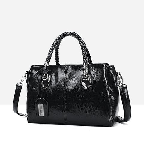 Geräumige schwarze Damen Handtasche aus Rindsleder, Retro, Doppelgriff.