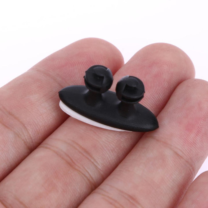 Selbstklebende Auto-Kabelhalter Clips für einfaches Kfz-Kabelmanagement. Ideal zur schnellen Befestigung im Fahrzeug.