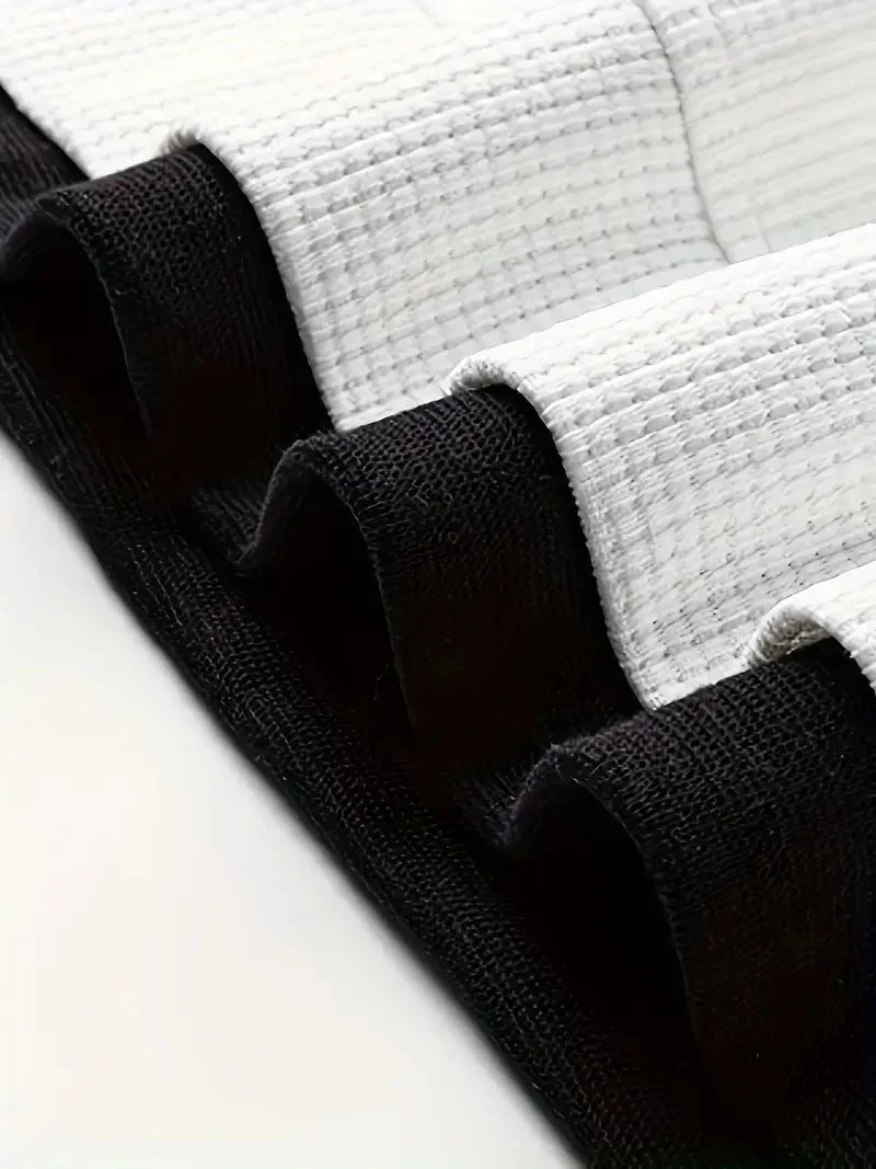 Modernes Herren Waffelstrick-Set: Lässiges T-Shirt & Shorts, perfekt für den Strand oder Stadt.