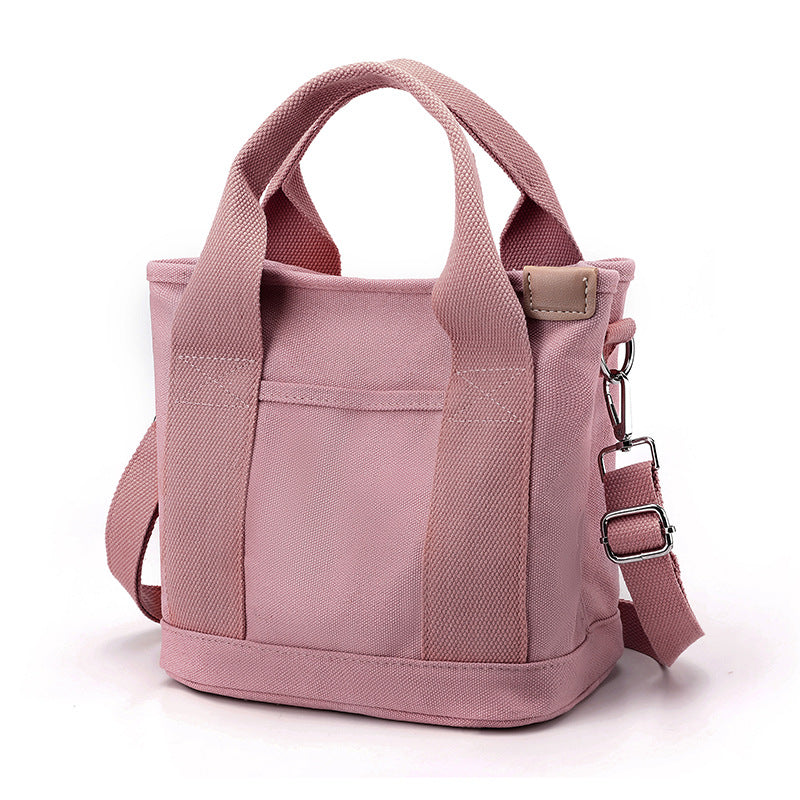 Geräumige Damen Umhängetasche in Schwarz, praktisch für Alltag, Reisen & Organisation. Modische Schultertasche.