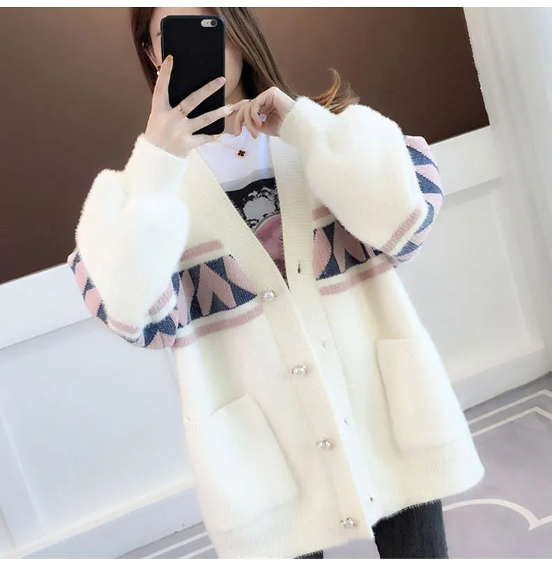Locker geschnittener Damen Strickpullover Übergröße, warm und modisch für die kalte Jahreszeit.