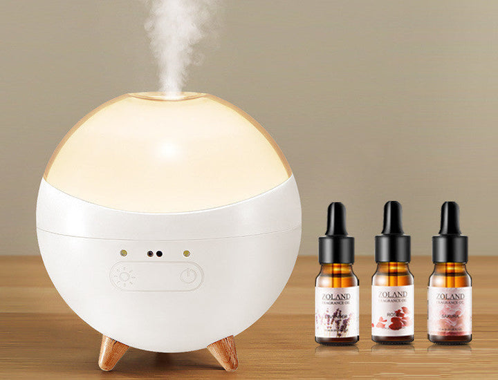 Minimalistischer Aroma Diffuser mit Gestensteuerung, der per LED-Licht eine beruhigende Atmosphäre schafft.