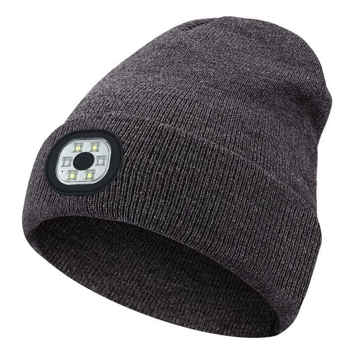 Warme Strickmütze (Beanie) mit Bluetooth-Kopfhörern & hellem LED-Licht für dunkle Winterabende im Freien.