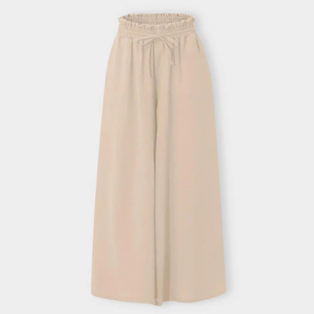Fließende Damen Wide Leg Hose mit hoher Taille. Feminine Palazzohose mit Gummibund für jeden Tag.