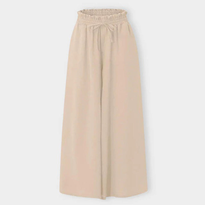 Fließende Damen Wide Leg Hose mit hoher Taille. Feminine Palazzohose mit Gummibund für jeden Tag.