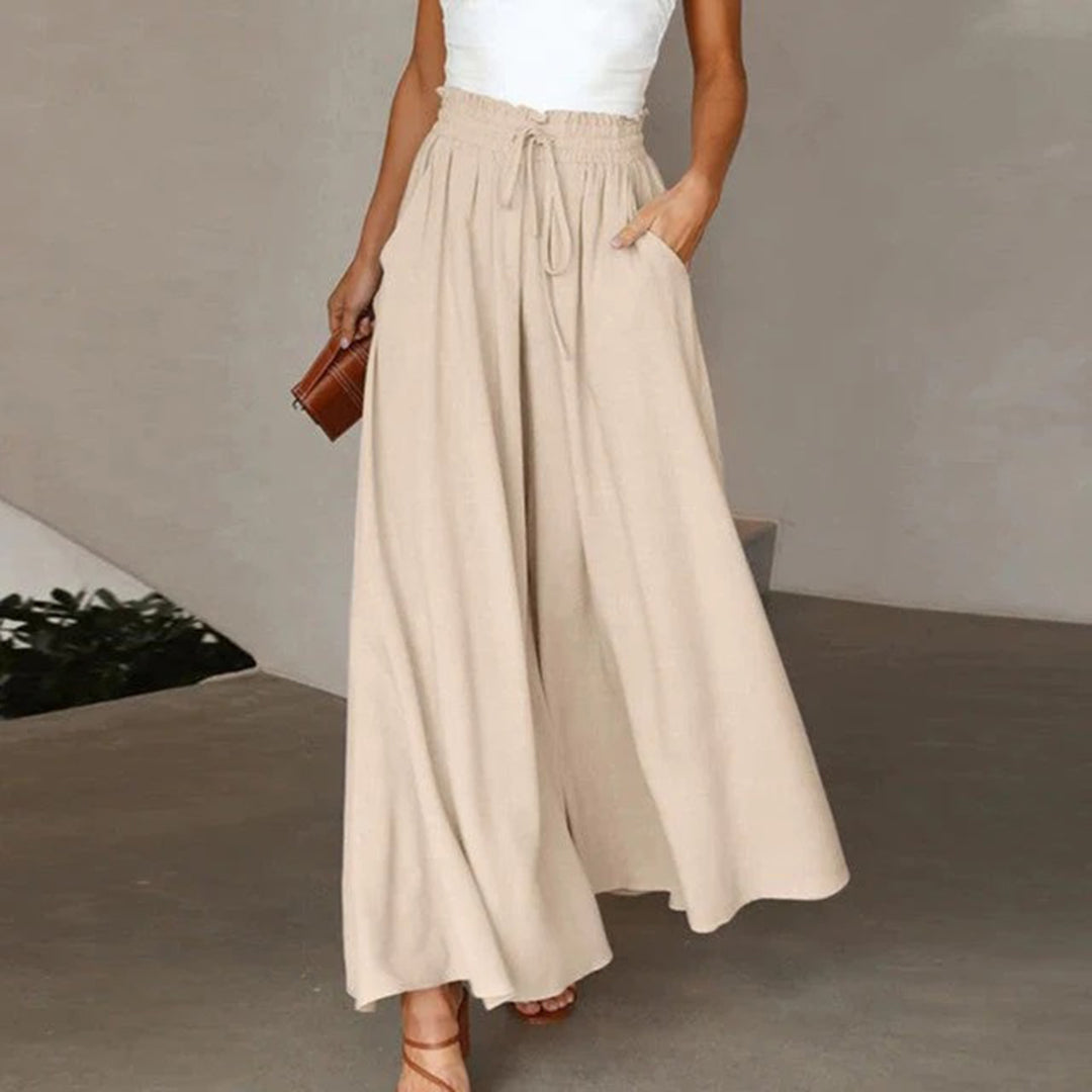 Alltagstaugliche Damen Wide Leg Hose mit elastischem Bund. Hohe Taille, weiches Material.