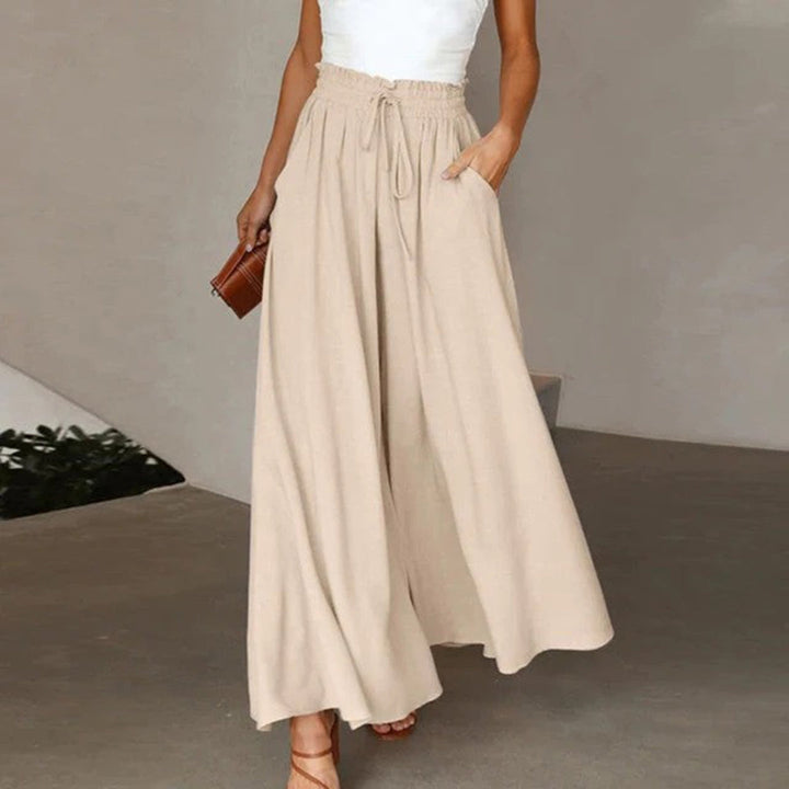 Alltagstaugliche Damen Wide Leg Hose mit elastischem Bund. Hohe Taille, weiches Material.