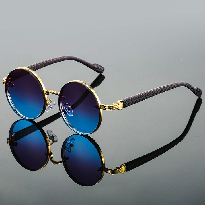 Vintage-inspirierte Sonnenbrille unisex. Rundes, leichtes Metallgestell mit UV400 Schutz für Damen & Herren im Sommer.