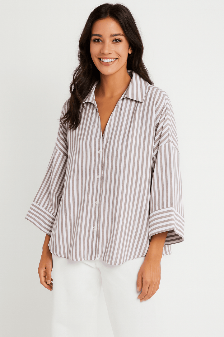 Bequeme gestreifte Damenbluse, 3/4-Ärmel, lockerer Schnitt. Ideal für Frühlings- und Sommeroutfits.