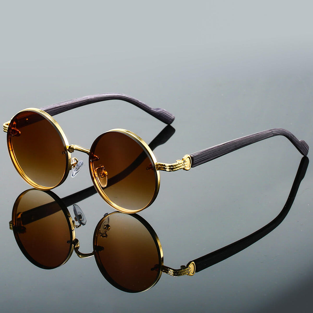 Stylische Retro Sonnenbrille für Damen & Herren. Rundes Metallgestell, UV400 Schutz, leicht & sommerlich-elegant.