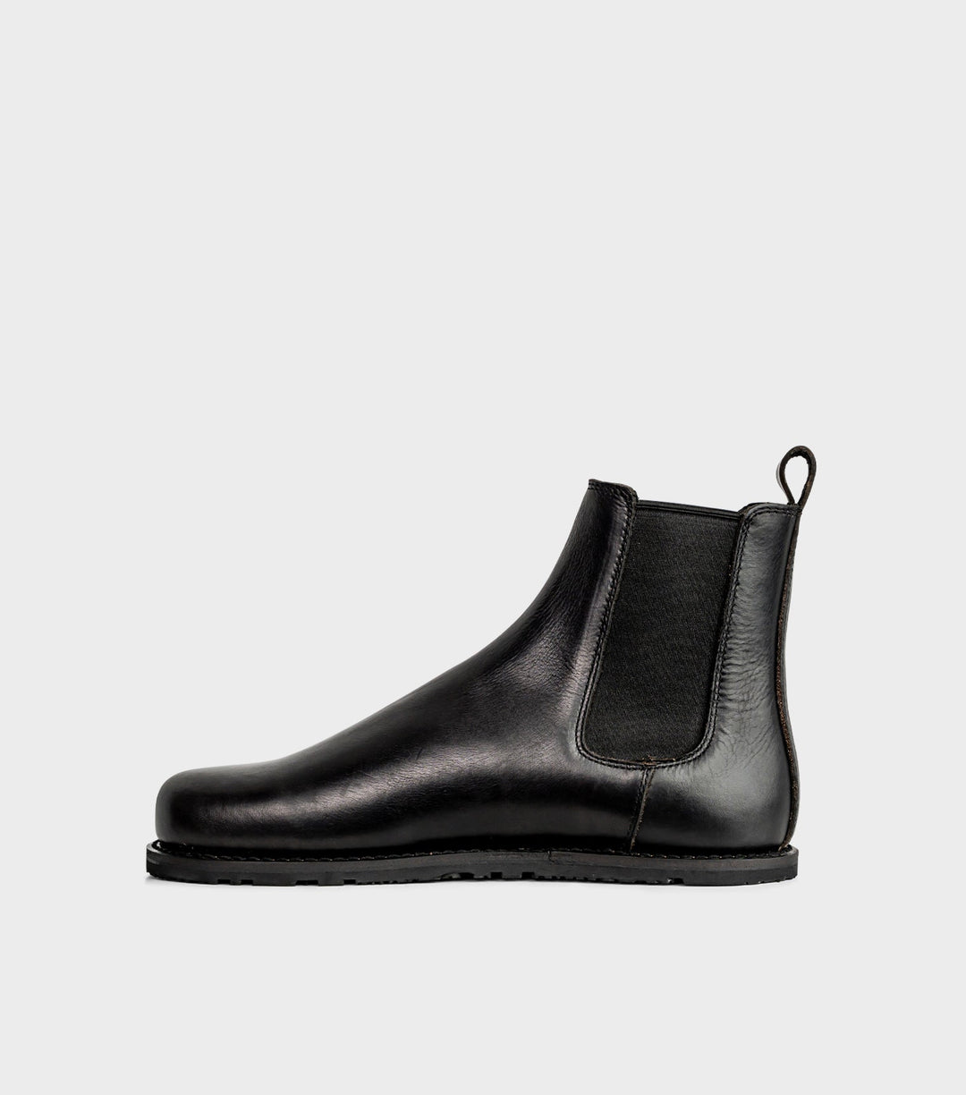 Elegante Unisex Chelsea Boots, vielseitig kombinierbar für Freizeit und Business, bieten Stil und Barfuß-Gefühl.