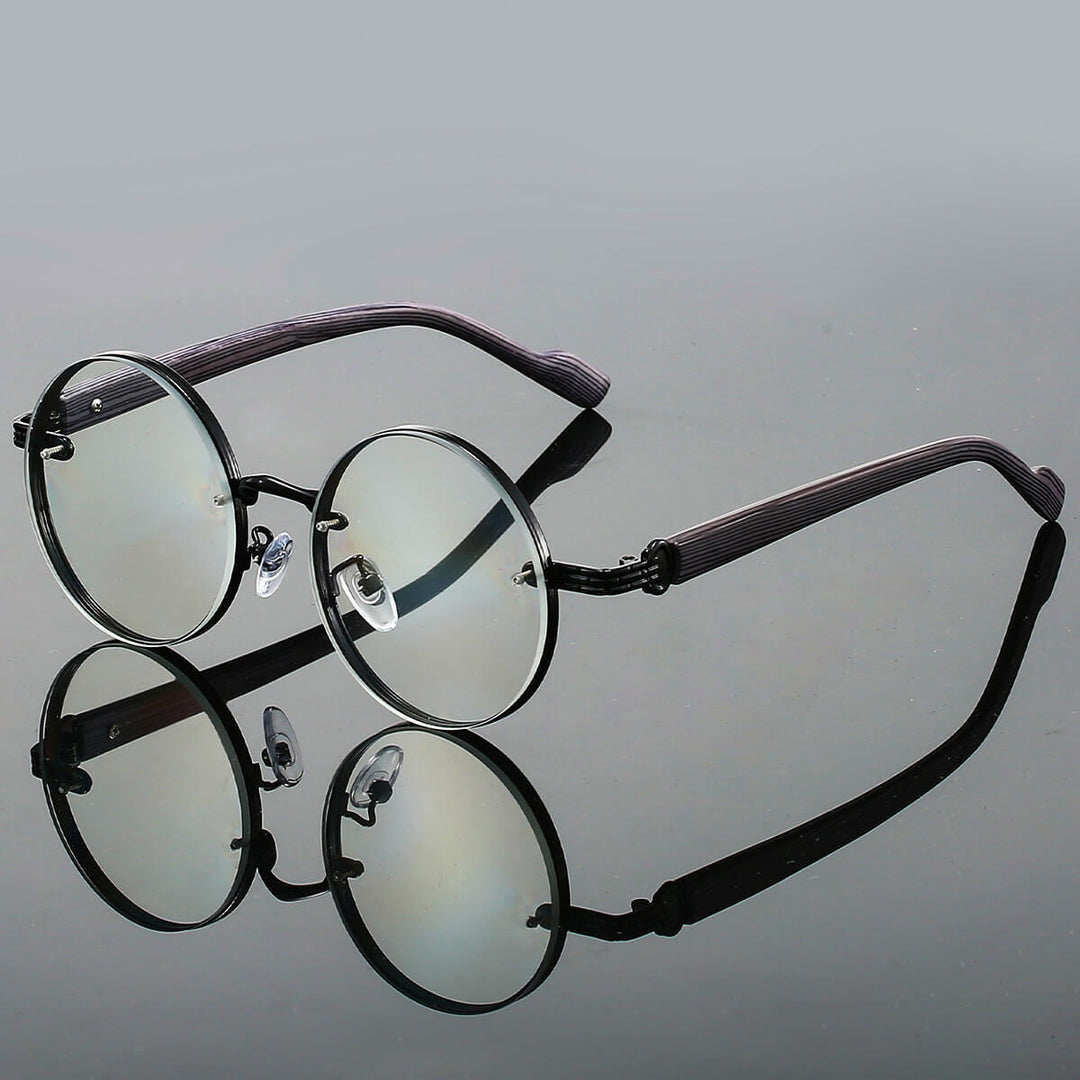 Damen & Herren Retro Sonnenbrille mit UV400 Schutz. Rundes Metallgestell, leicht & zeitlos für den Sommer.
