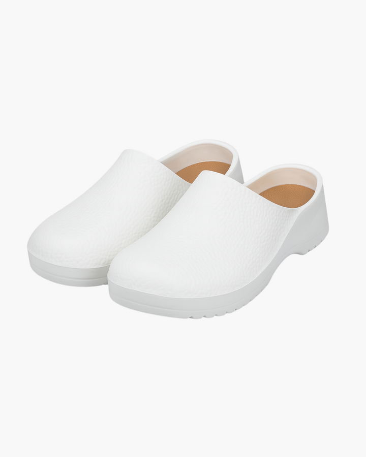 Weiße Damen Clogs, bequeme und rutschfeste Berufsschuhe für Damen in Küche, Pflege und medizinischen Berufen.