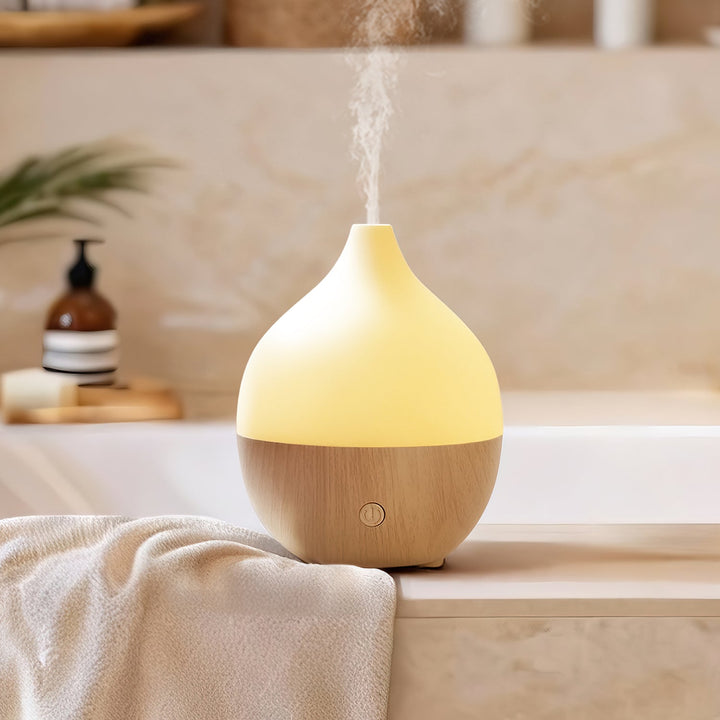Kleiner Aroma Diffuser mit Kaltnebel und Luftbefeuchter-Funktion, perfekt für Schlafzimmer & Büro.
