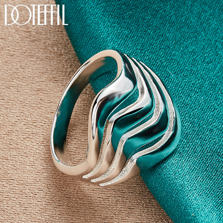 Hochwertiger vierzeiliger Sterlingsilberring für Damen & Herren, glatt & stilvoll.