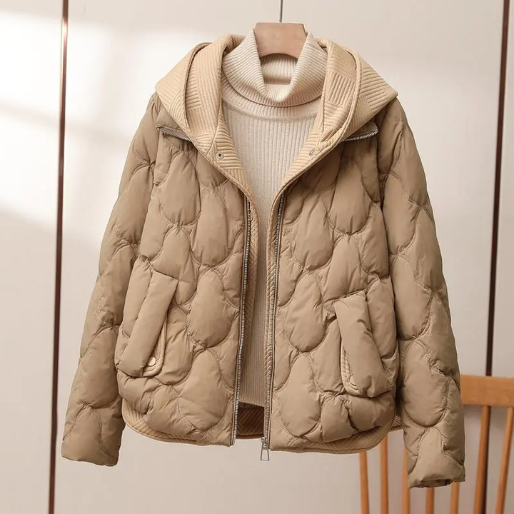 Damen Winterjacke, warm und stilvoll, ideal für kalte Tage und winterliche Outdoor-Aktivitäten. Modische Oberbekleidung.