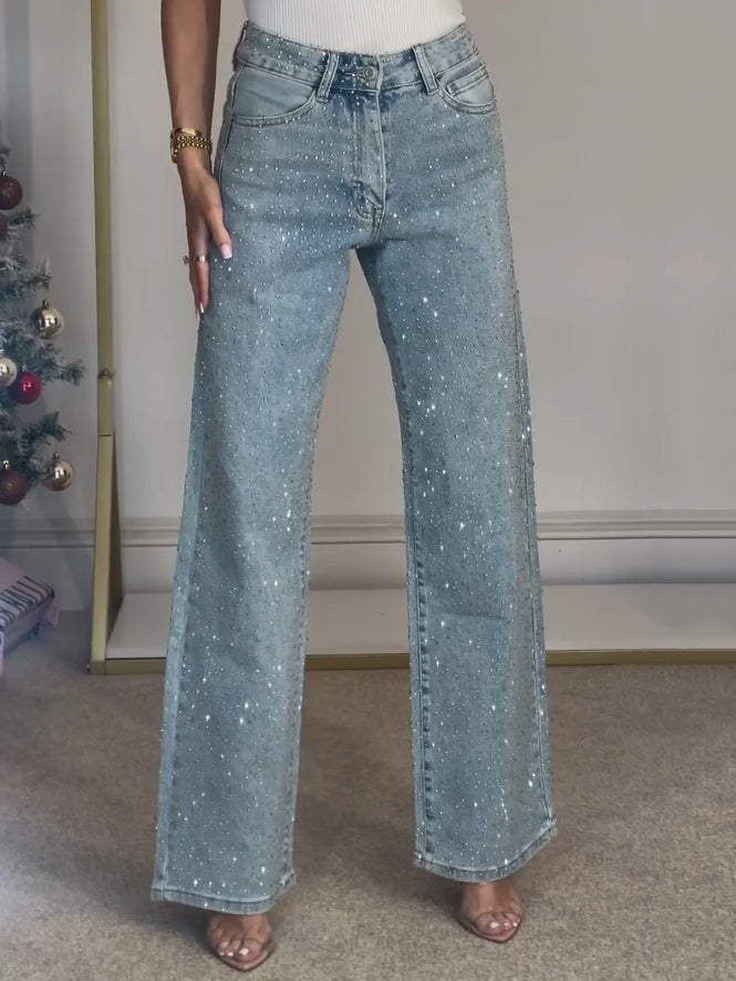 Bequeme High-Waist Schlagjeans für Damen, mit dezentem Glitzer und ausgestelltem Bein. Perfekt für den Alltag.