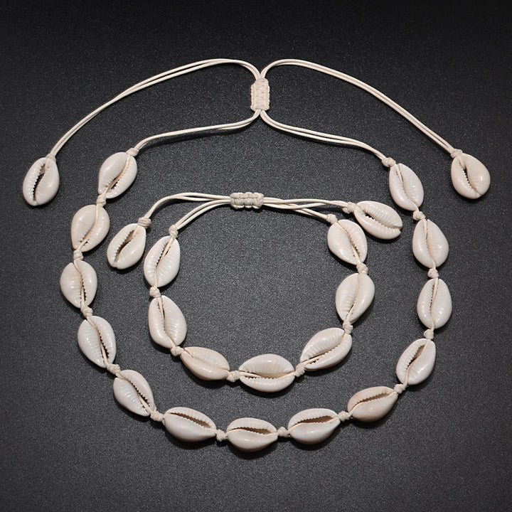 Stylisches Unisex Muschelarmband mit Naturmuscheln und robuster Seilkette. Perfektes Accessoire für den Strand-Look.