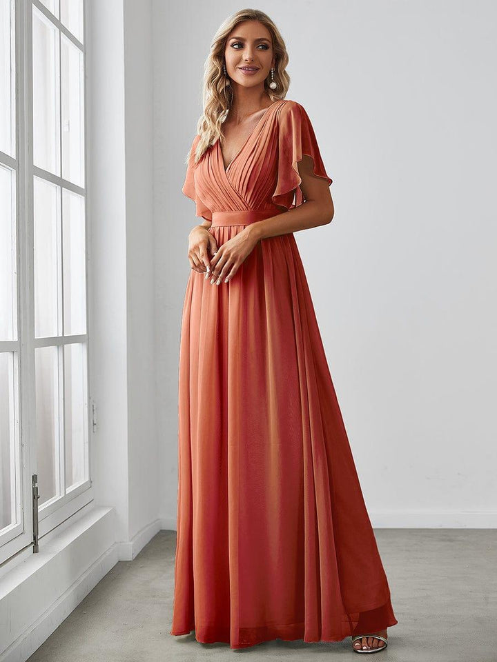 Stilvolles mintgrünes Abendkleid A-Linie, V-Ausschnitt & Flügelärmel, für Hochzeitsgäste.