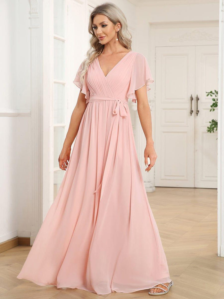 Elegantes mintgrünes A-Linie Abendkleid mit V-Ausschnitt & Flügelärmeln, für Gala.