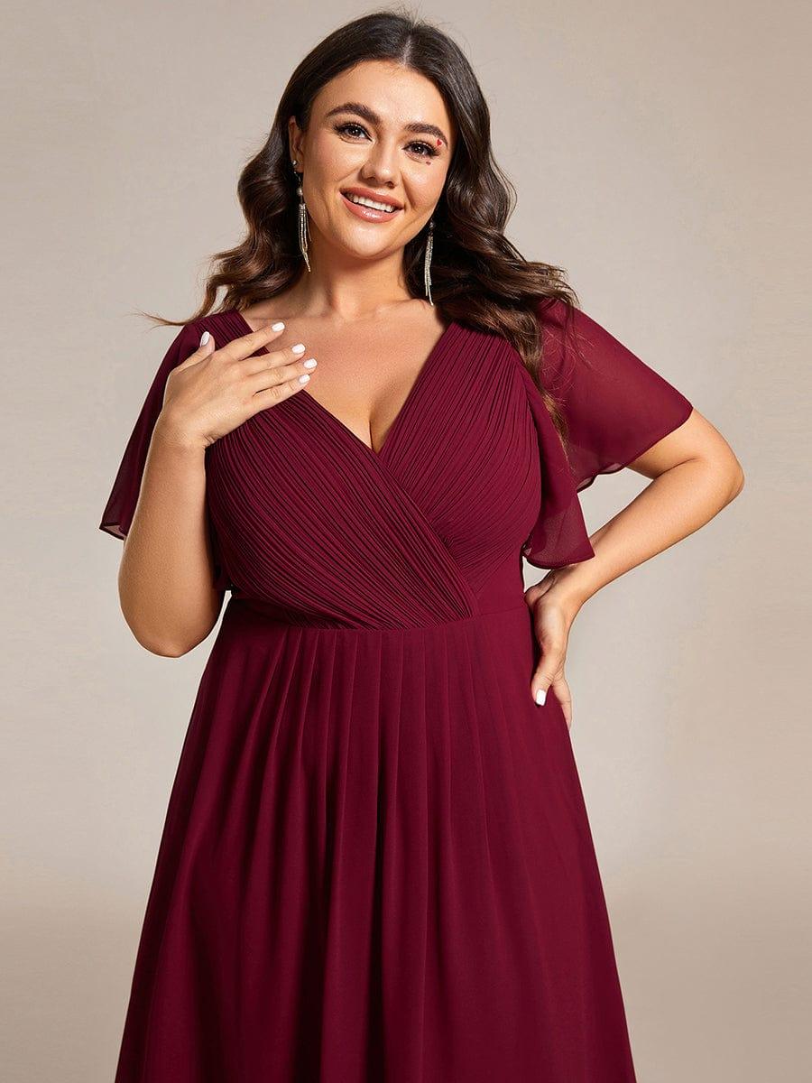 Festliches Schwarzes Partykleid im Vokuhila-Schnitt, Empire-Taille, A-Linie; perfekt für Anlässe.