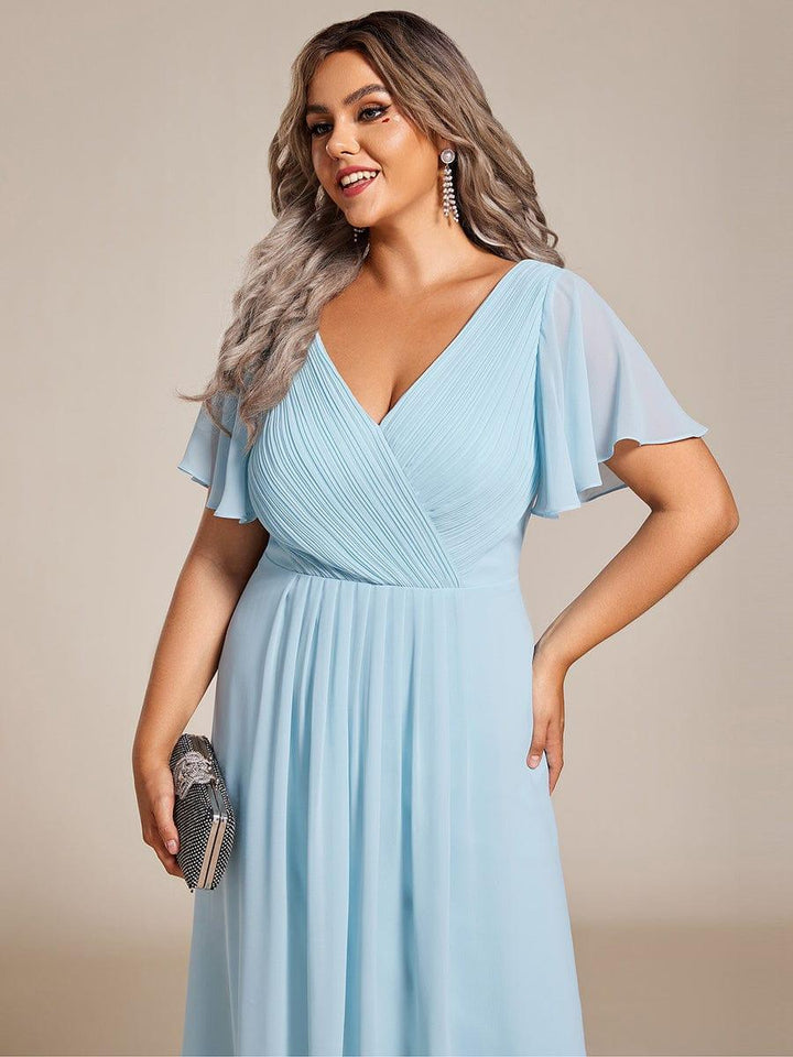 Cremefarbenes Vokuhila Sommerkleid mit Kurzarm für Hochzeitsgäste; stilvolles Midi-Damenkleid.