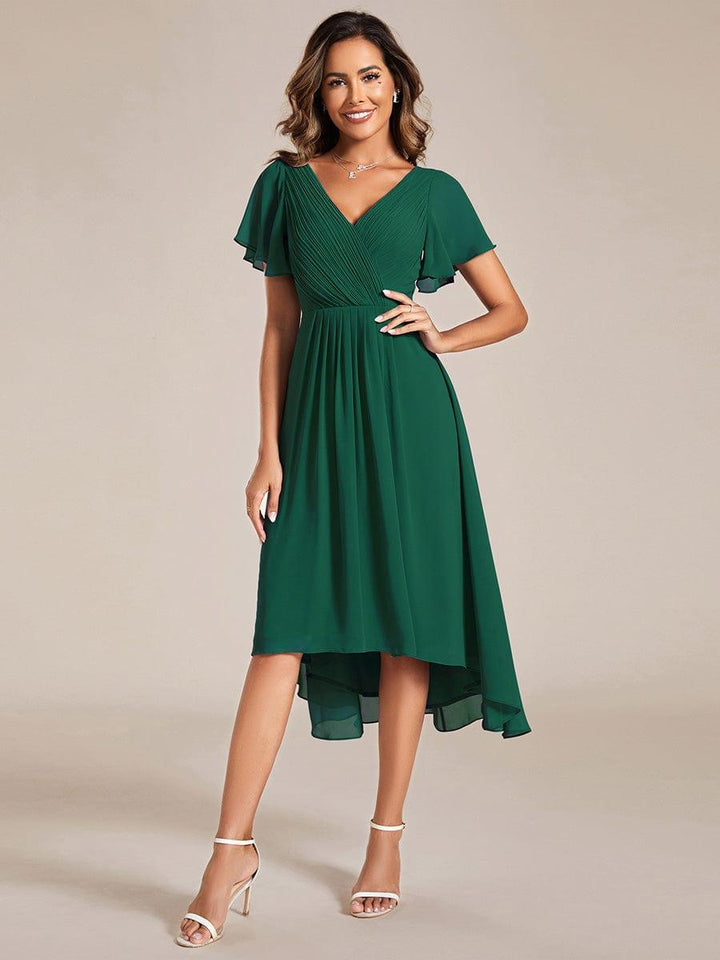 Türkises Vokuhila Abendkleid für Damen, elegant & festlich für Hochzeiten oder besondere Anlässe.