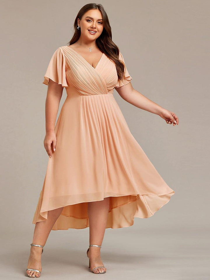 Glamouröses Champagnerfarbenes Vokuhila Abendkleid, figurschmeichelnde A-Linie und Empire-Taille; festlich.