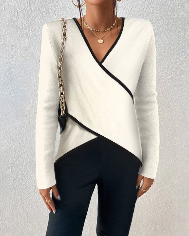 Zeitloser Damen Wickelpullover mit V-Ausschnitt. Bequem, stilvoll und vielseitig. Ideal als modisches Langarm-Oberteil für Damen.