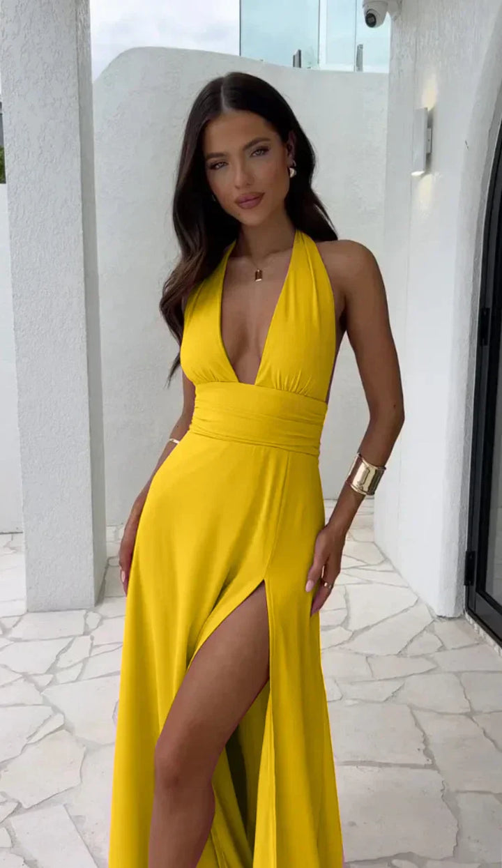 Luftiges Sommerkleid für Damen mit V-Ausschnitt. Ein elegantes und bequemes Kleid, perfekt für warme Tage und stilvolle Auftritte.