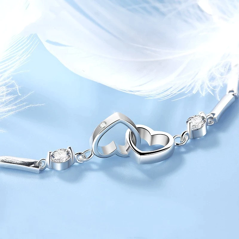 Romantisches Damen Doppelherz Silberarmband (925er) als Geschenkidee; Ausdruck ewiger Liebe und Zuneigung.