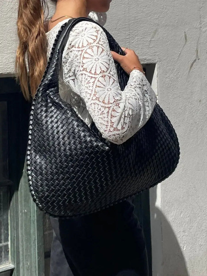 Damen Hobo Handtasche in Schwarz, elegant und geräumig, vielseitige Schultertasche für den Alltag.