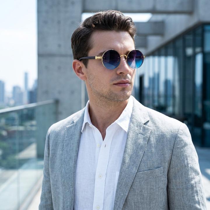 Unisex Vintage Sonnenbrille mit UV400 Schutz. Rundes Metallgestell, leicht & stylisch für Damen & Herren im Sommer.