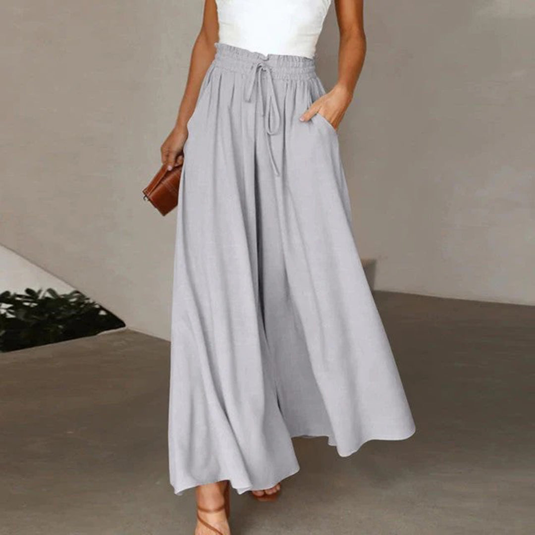 Leichte Damen Wide Leg Hose mit hoher Taille. Luftige Sommerhose mit bequemem Gummibund.