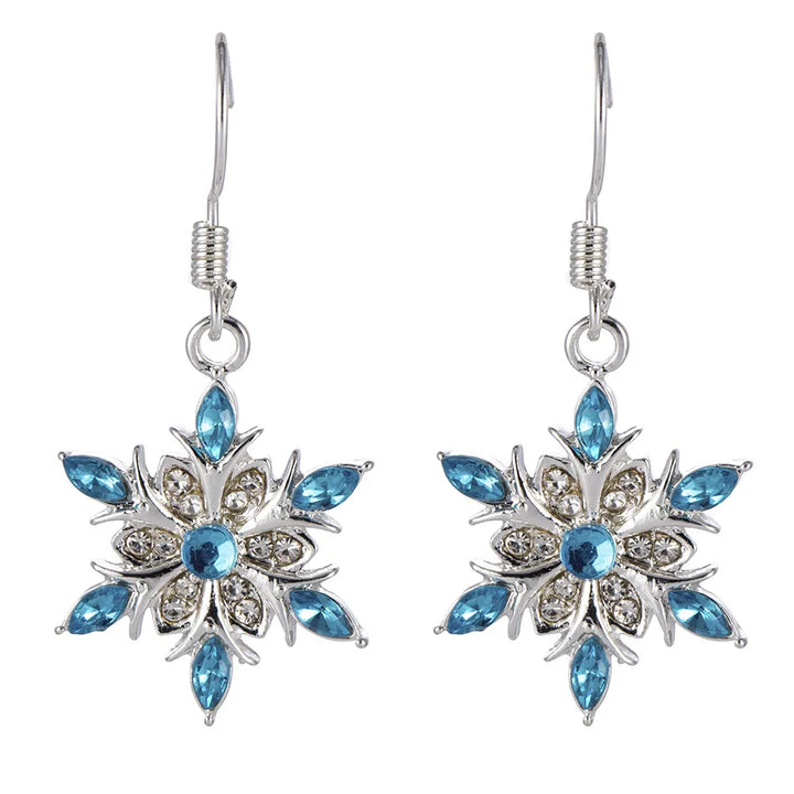 Damen-Schneeflocken-Ohrringe mit blauen Strasssteinen. Eleganter Winterschmuck für festliche Anlässe.