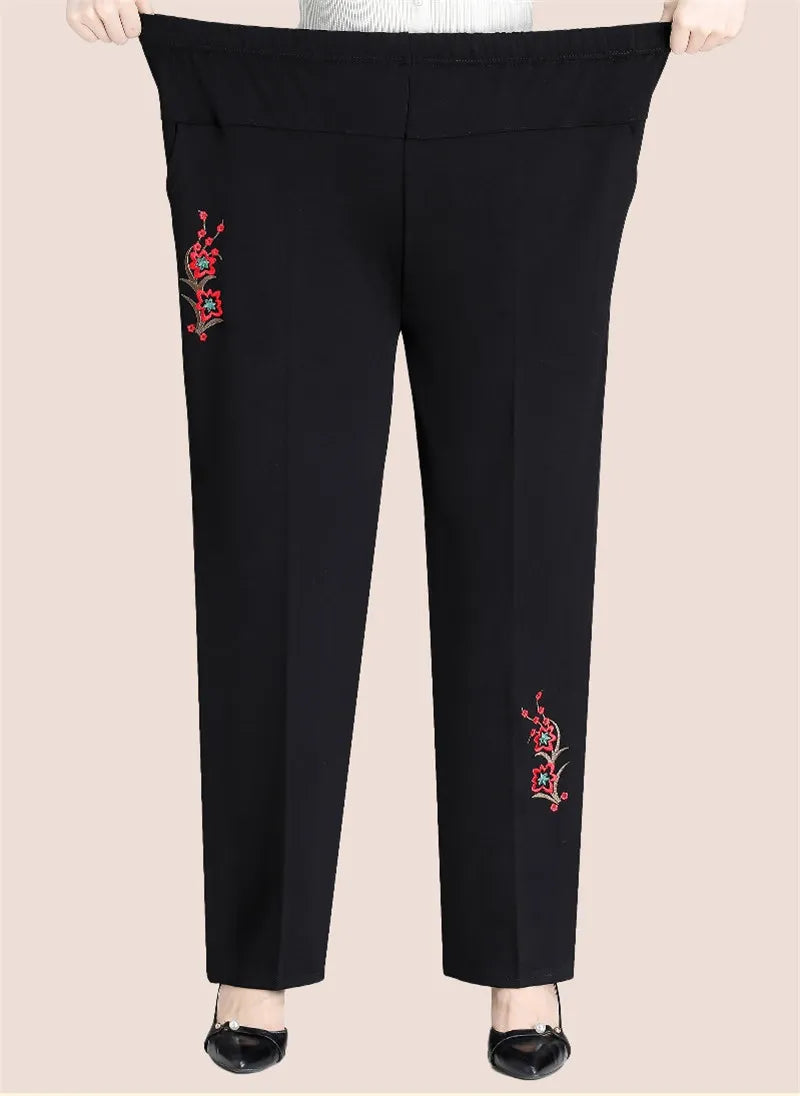 Elegante Damen Übergröße Hose mit hoher Taille und floraler Stickerei, ideal für Herbst- & Wintermode.