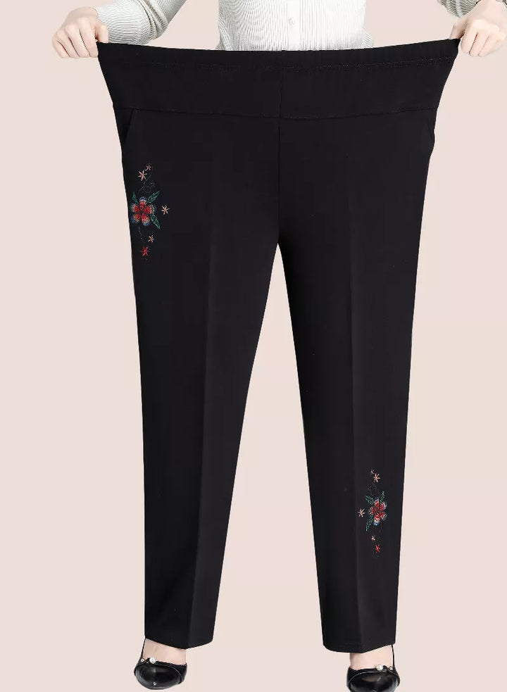 Stylische Damen Plus Size Hose mit hoher Taille, detailliert bestickt, perfekt für gemütliche Herbsttage.