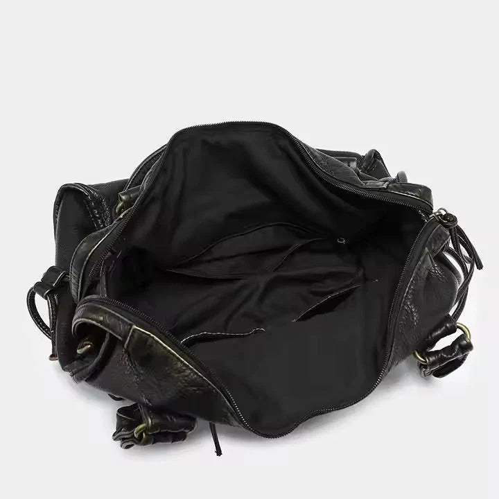 Robuste Damen Schultertasche aus hochwertigem Vintage-Veganleder. Elegantes Design, ideal für täglichen Gebrauch.