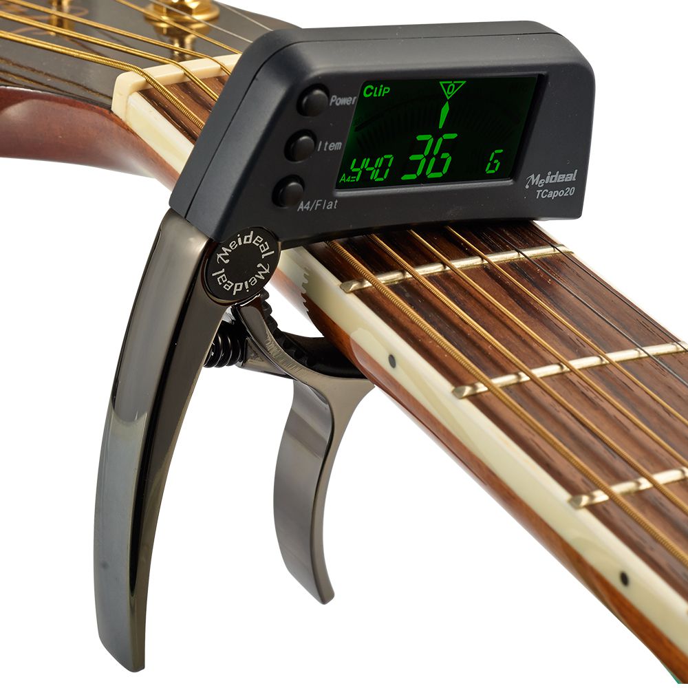 Essentielles Musikzubehör: Präzises Gitarren Capo und Stimmgerät 2-in-1 für anspruchsvolle Musiker.