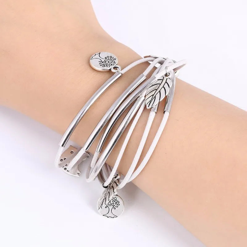 Bohemian Schmuck: Mehrschichtiges Armband mit Blättern & Vogel, Unisex.