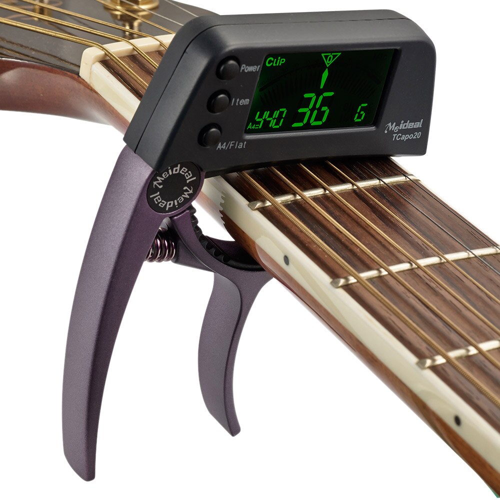 Präzisions-Gitarren-Tuner und Capo, unverzichtbares Instrumentenzubehör für makellose Darbietungen an Gitarre.