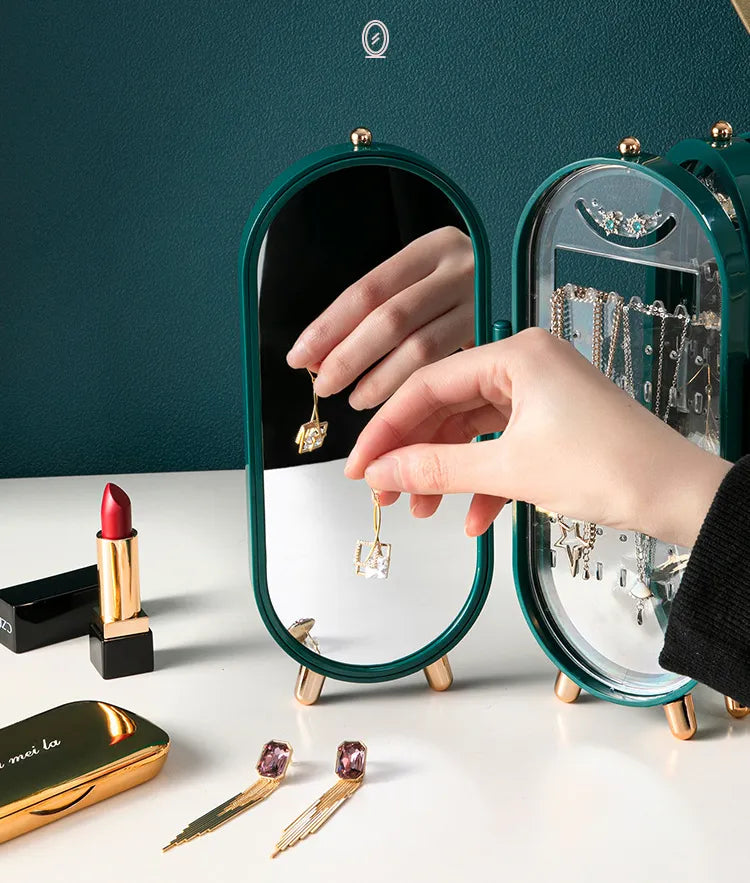 Kompakte, faltbare Schmuckaufbewahrung, oval, mit Spiegel für Halsketten, Ringe und Armbänder.